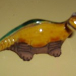 Dinosaurio de cerámica